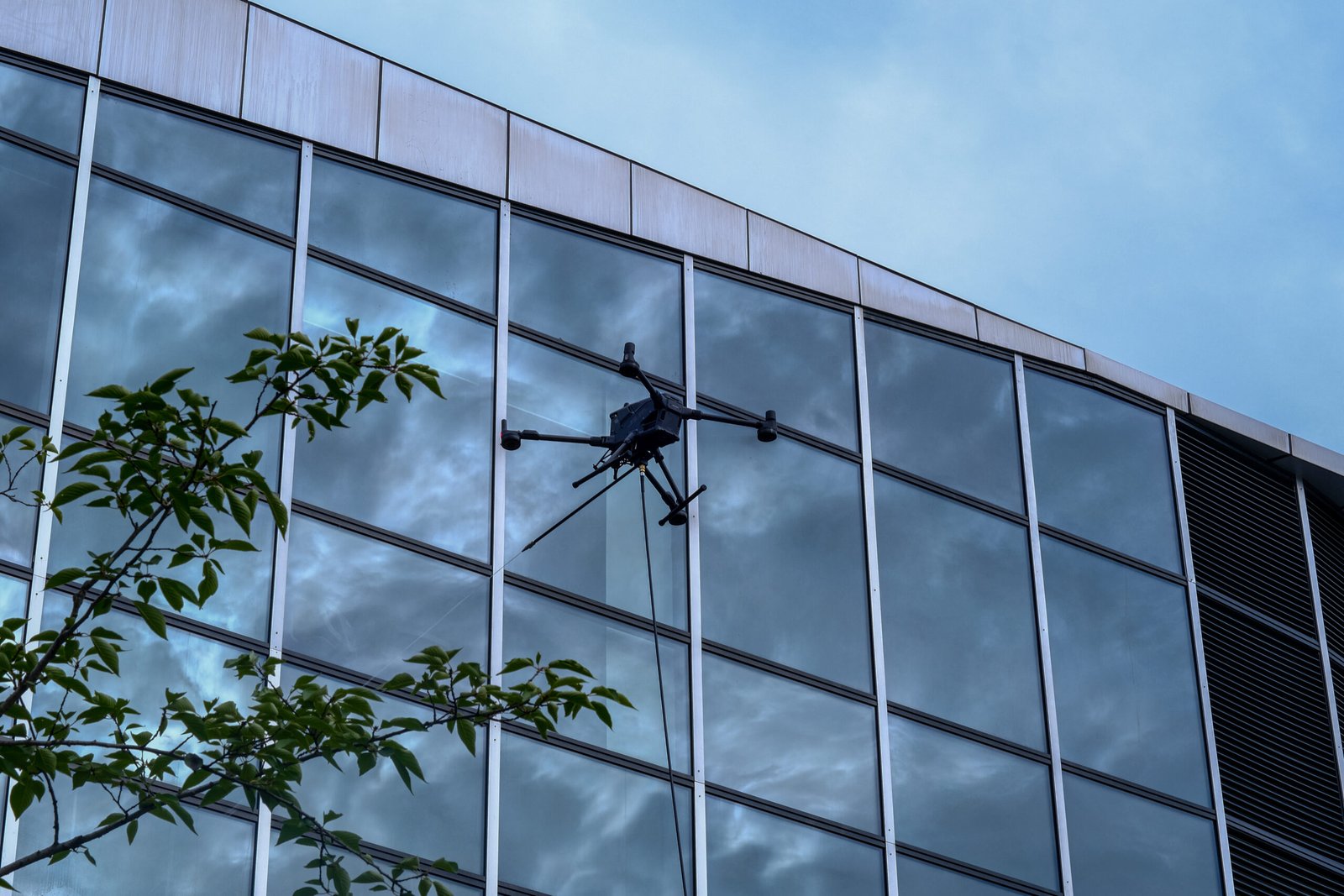 Concept visualization of UAV facade cleaning